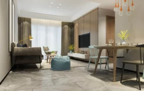 Imagem da sala de jantar integrada a sala de tv de um imóvel moderno para ilustrar matéria sobre apartamento funcional