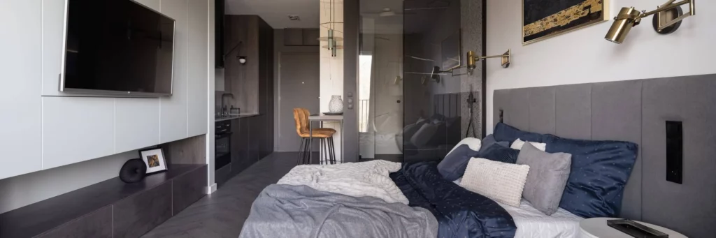Imagem de um studio mobiliado com conceito aberto para ilustrar matéria sobre o que é apartamento studio